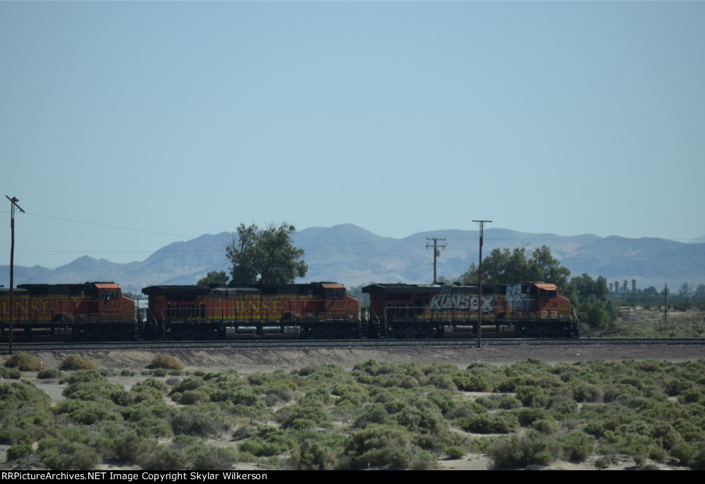 BNSF 7738, 5167, and 5147